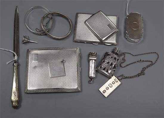 Two silver engine-turned cigarette cases, a similar vesta case, a silver-gilt snuff box and sundries,